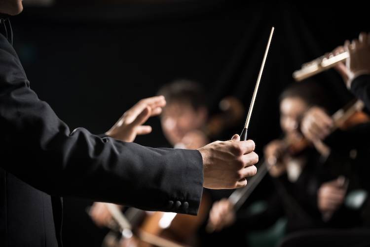 Composer directing an orchestra during Spoleto Festival