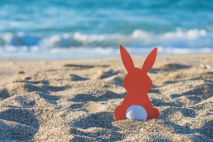 Easter bunny cutout in the sand